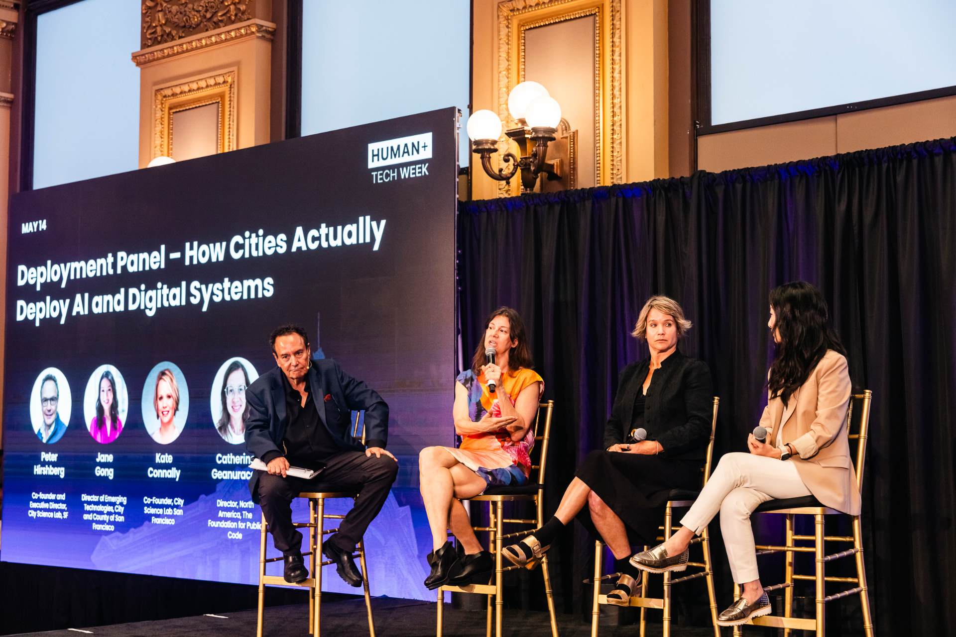 A deployment panel on how cities deploy AI and digital systems at the REACH cities summit.